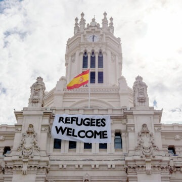 "Refugees Welcome" placard in Madrid, Spain Europa wykorzeniona